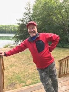 Claude on the deck of the cabin