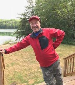 Claude on the deck of the cabin